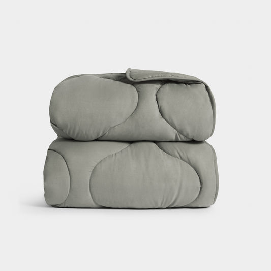 Couverture douillette matelassée en gris