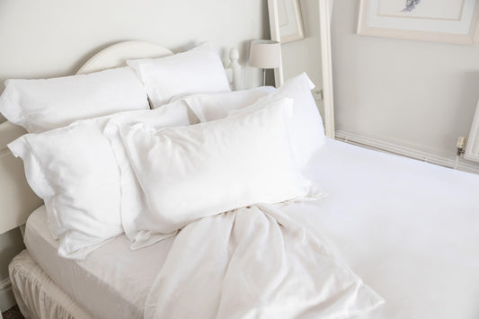 Ethical bedding white bed set on bed