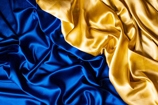 Close-up Smooth Silk Fabric in Blue and Yellow Colors